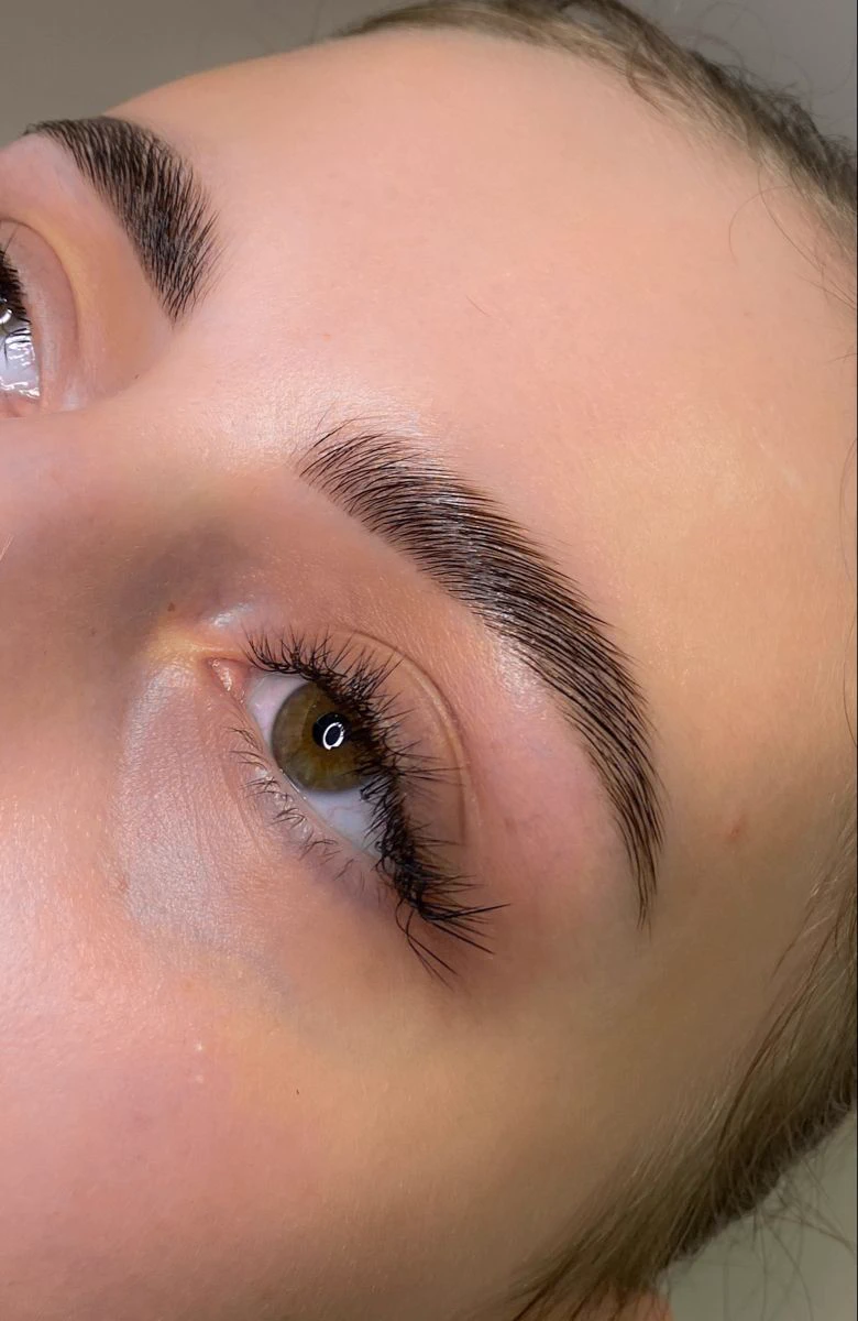 Brow lamination result: a smoothed, lifted brow with a soft, defined finish